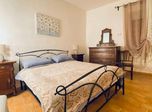 Camera da letto con letto in ferro battuto